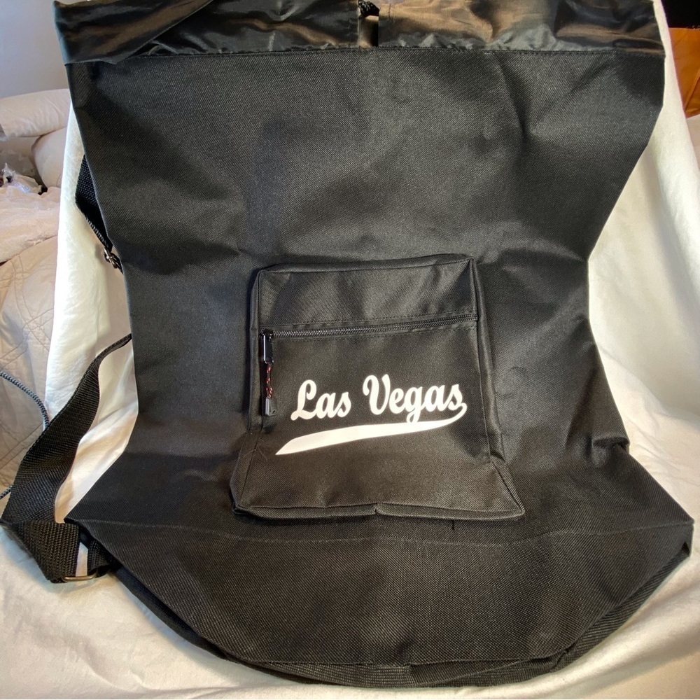 6 for$20♥️ BNWT Large Sling “Vegas” backpack.
